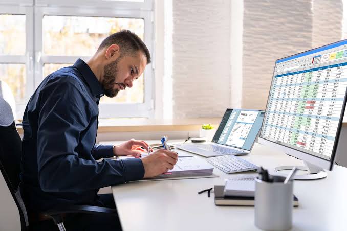 Accountant Working on Financial Records